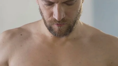 Man with beard flossing his teeth properly, mouth health care, closeup video Stock Footage