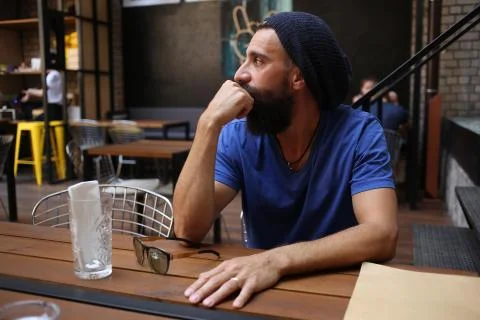 Man with beard looking away Stock Photos