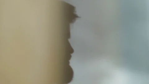 Man With Beard Looking Out Window Stock-Footage 78013743