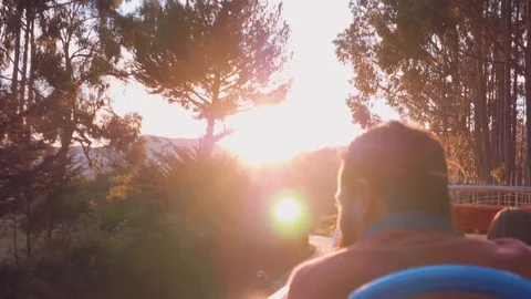 Man with beard on open tour bus in beatiful golden hour Stock Footage 91400540