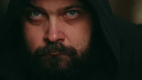 A man with a beard shakes head, denial then agrees Stock Footage 195993585