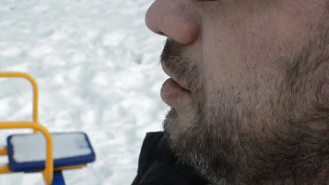 Man with beard smokes a cigarette Stock Footage 85706392