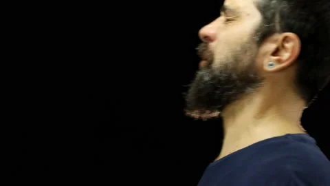 Man with beard sneezing in slow motion. Stock Footage 157981561