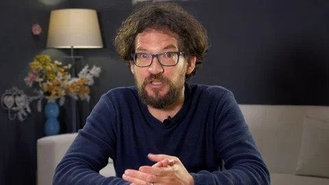 Man with beard talking and teaching looking camera Stock Footage 116734810