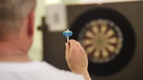 Man with a Beard Throws Darts. Stock Footage 249084479