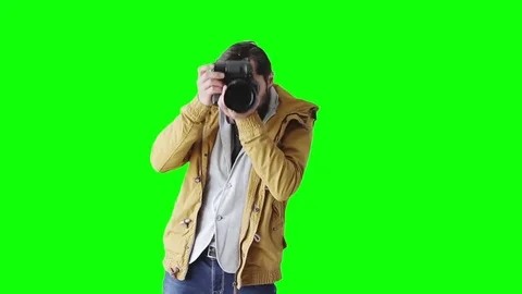 A man with a beard uses a camera Stock Footage 75671534