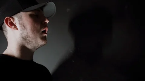 Man with beard vaping an electronic cigarette Stock Footage 105616686