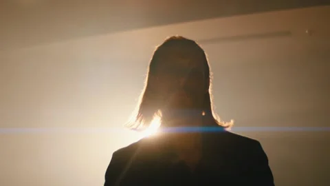 A man with a beard walks in the spotlights Stock Footage 141980829