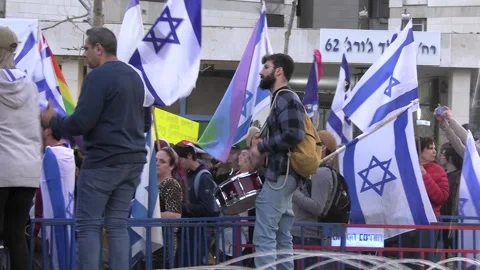 Man beating drum at Israeli judicial reform protests in Jerusalem Video stock 237083591