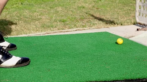 Man beats a golf ball Stock Footage 75217081