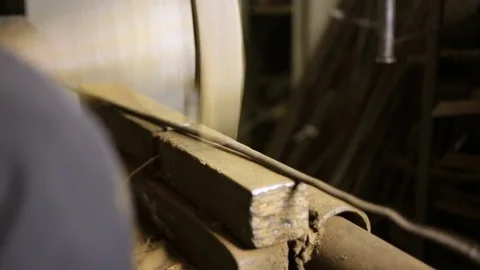The man beats the hammer on the anvil. View from the right side. The person alig Stock Footage 83073117