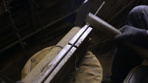 Man beats with hammer. Preparation of materials for the Foundation, fence and ba Stock Footage 83073237