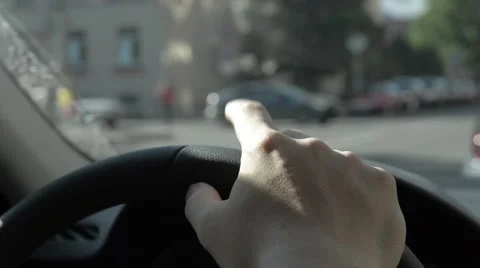 Man beats out the rhythm with your fingers on the steering wheel. Stock Footage 51756701