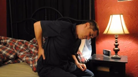 Man on Bed with Back Pain Stock-Footage 40100576