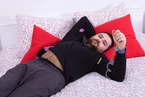 Man in bed Stock Photos