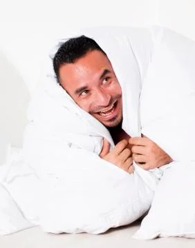 Man in bed Stock Photos