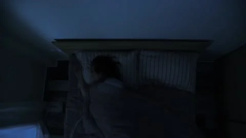 Man in bed toss and turn. Stock Footage 147104238
