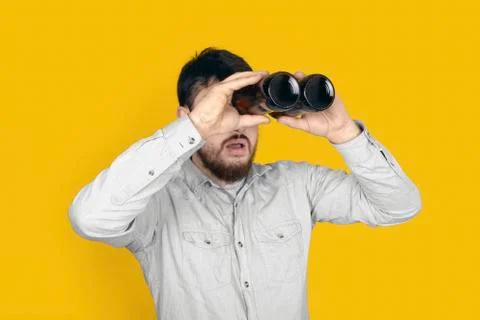 Man with beer binoculars Stock Photos