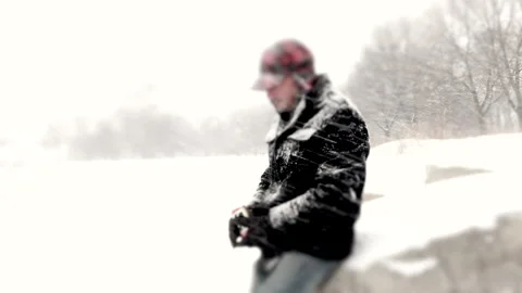 Man with Beer During a Blizzard Stock Footage 162257353