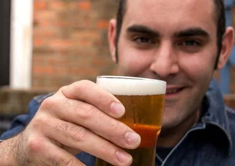 Man with beer Stock Photos