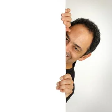Man behid billboard Stock Photos