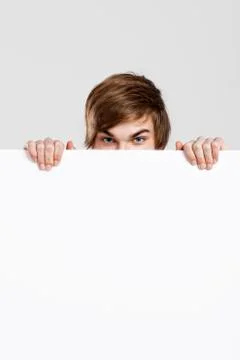 Man behind a cardboard Stock Photos