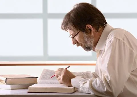 Man behind a desk Stock Photos