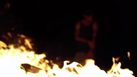Man behind fire Video stock 229906699