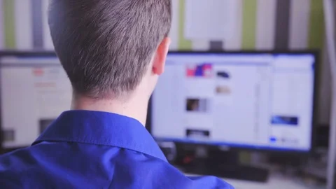 Man behind PC having neck pain 4K Stock Footage 71557157