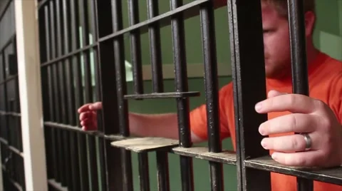 Man Behind Prison Bars With Regrets Stock Footage 53090380