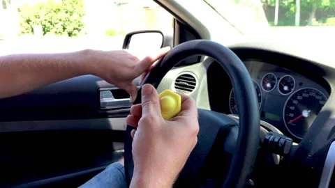 Man behind the wheel with an entress Stock Footage 197641639