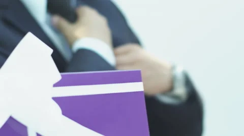 Man being adjusted his tie Stock Footage 57870107