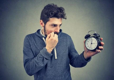 Man being anxious about time pressure Stock Photos