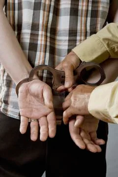 A man being arrested Stock Photos