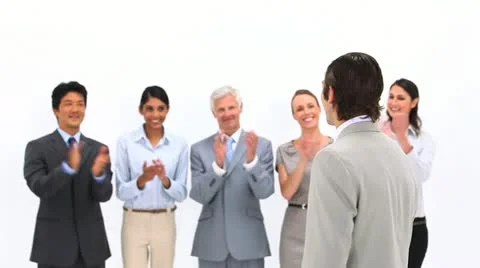 Man being congratulated by his co-workers Stock Footage