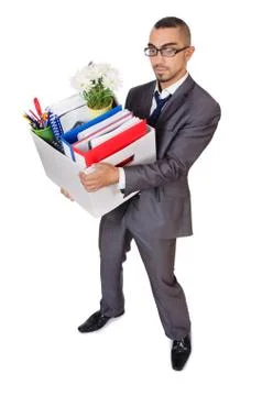 Man being fired with box of personal stuff Foto stock