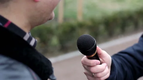 The man being interviewed on the street Stock-Footage 119114683