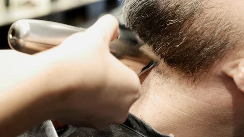 Man being shaved Stock Footage 121152837