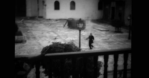 Man being shot by a murderer Stock Footage 43456083