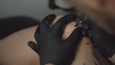 Man being tattooed close up view Stock-Footage 128437664