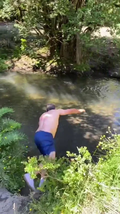 Man Belly Flops Into Puddle, Puren, Chile - 09 Jan 2021 Stockbeeldmateriaal 347673773