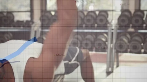 Man on bench starting one-arm dumbbell press, pressing for fitness, grid charts Stock Footage 333287425