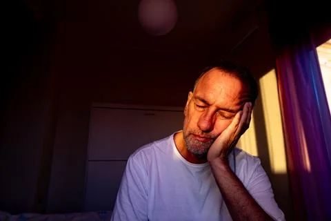 A man between 55 and 60 years old taking a break while enjoying the sun str.. Stock Photos