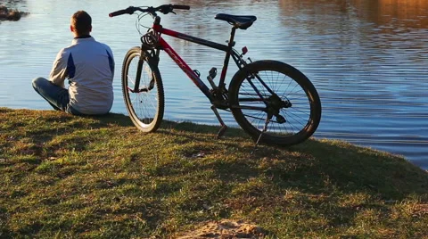Man with a bicycle Stock Footage 65412067