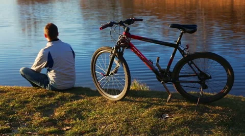 Man with a bicycle Stock Footage 65479615