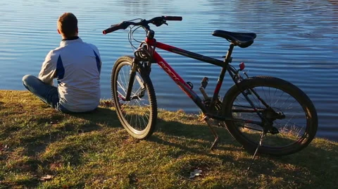 Man with a bicycle Stock Footage 65812022