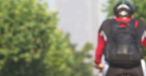 Man with bicycle in the park Stock Footage 53749484