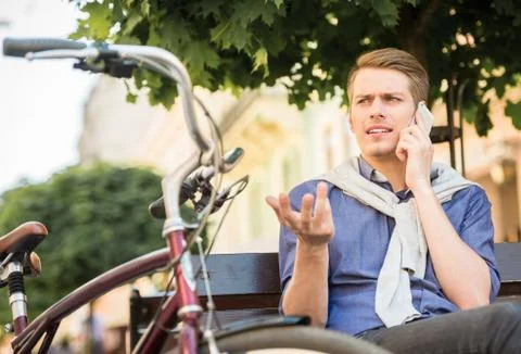 Man with bicycle Stock Photos