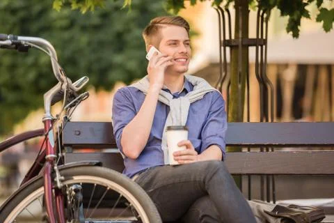 Man with bicycle Stock Photos