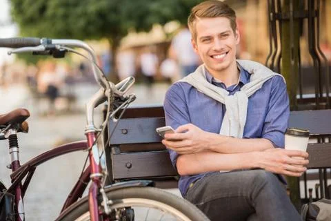 Man with bicycle Stock Photos